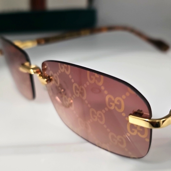 GUCCI UNISEX GG1221S 004 GUCCI RIMLESS GG LOGO ON LENS SUNGLASSES - Picture 2 of 13